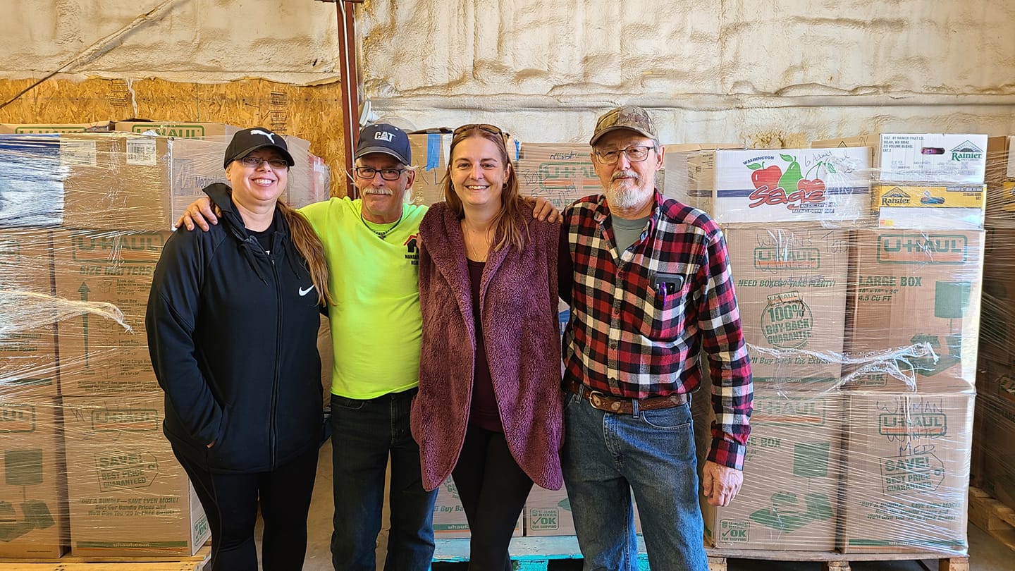 ND Lions Emergency Relief volunteers at the storage facility — built by survivors, run by neighbors
